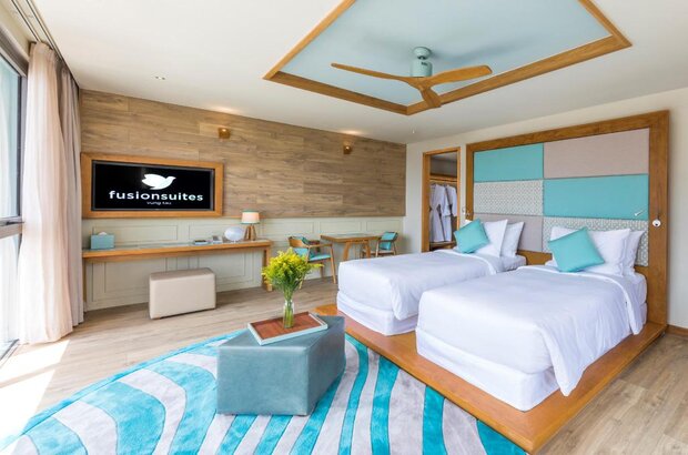 Phòng ngủ tại căn hộ studio được thiết kế với gam màu xanh tươi mát